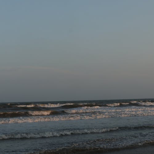 Immagine gratuita di luce del tramonto, onde, tramonto sulla spiaggia
