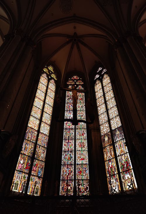 Crucifix and Stained Glass Windows in Cologne Cathedral