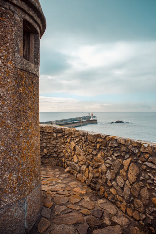 Fotos de stock gratuitas de mar, muelle, muro