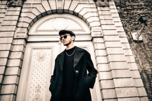 Man in Black Coat and Sunglasses