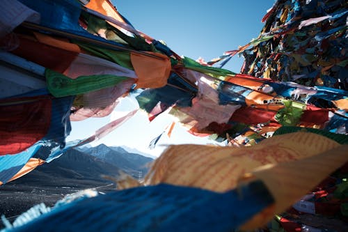 Mountains behind Colorful Cloths