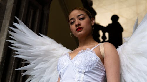Model Posing with Angel Wings