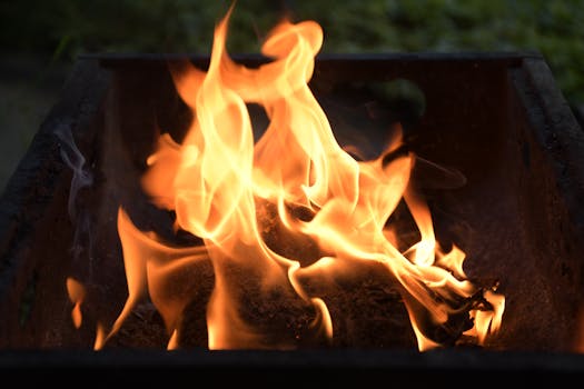Captivating close-up of lively flames dancing in an outdoor firepit in Japan.