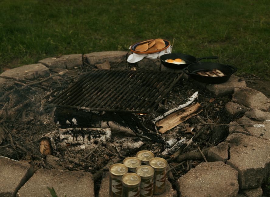 Campfire grate ready for cast iron breakfast cooking