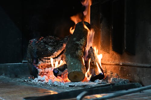 Burning Firewood in Fireplace