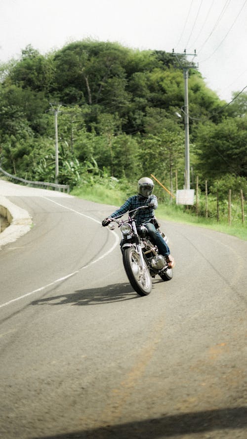 Riding Motorbike on Road