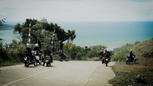 People on Motorbikes on Road
