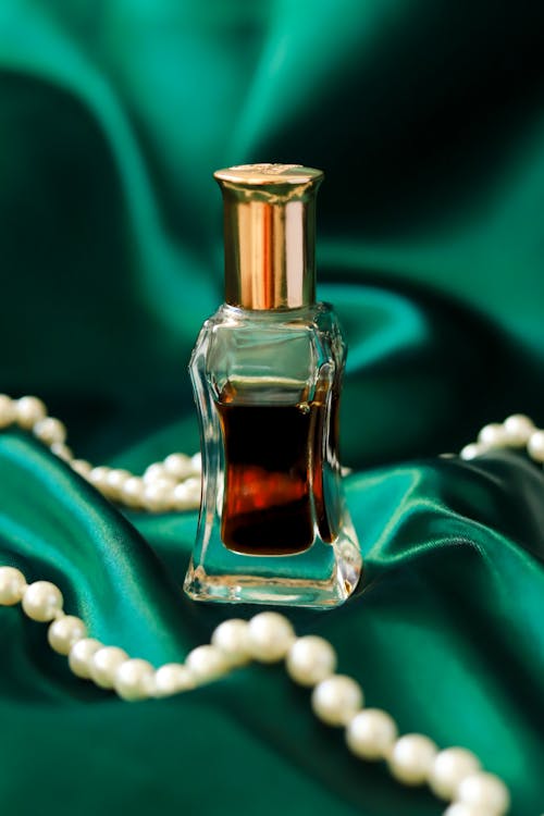 Beads around Perfume Vial