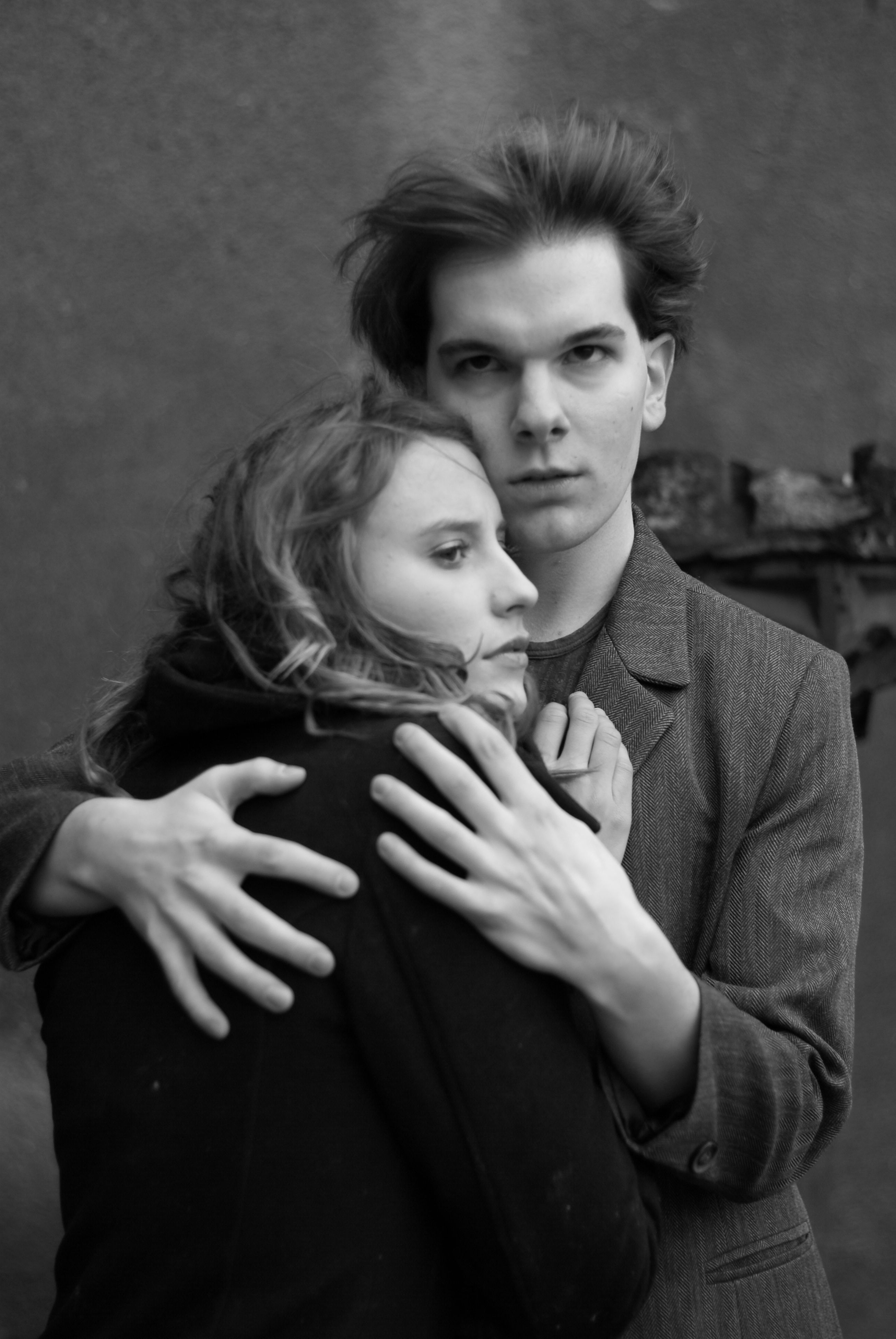 A black and white photo of a man and woman hugging · Free Stock Photo