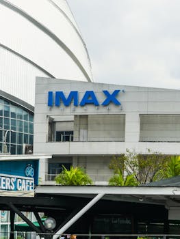 View of IMAX Theatre in Pasay, showcasing modern architectural style and urban environment.