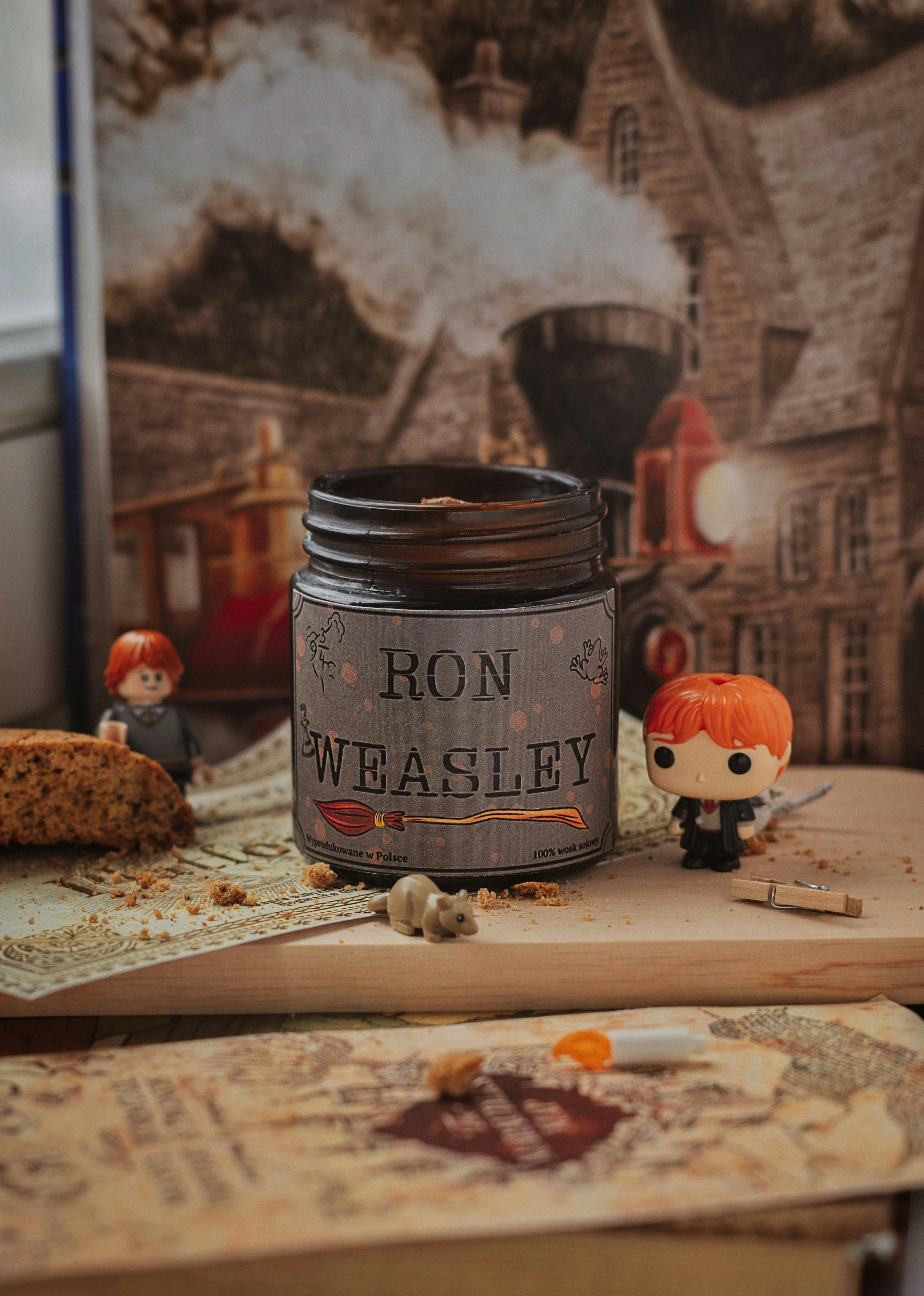 Scented Candle and Ron Weasley Figurine from Harry Potter · Free Stock