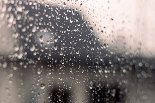 Free Raindrops on Window Glass Stock Photo