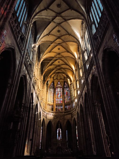 Free Spectacular Gothic arches and stained glass in St. Vitus Cathedral, Prague. Stock Photo