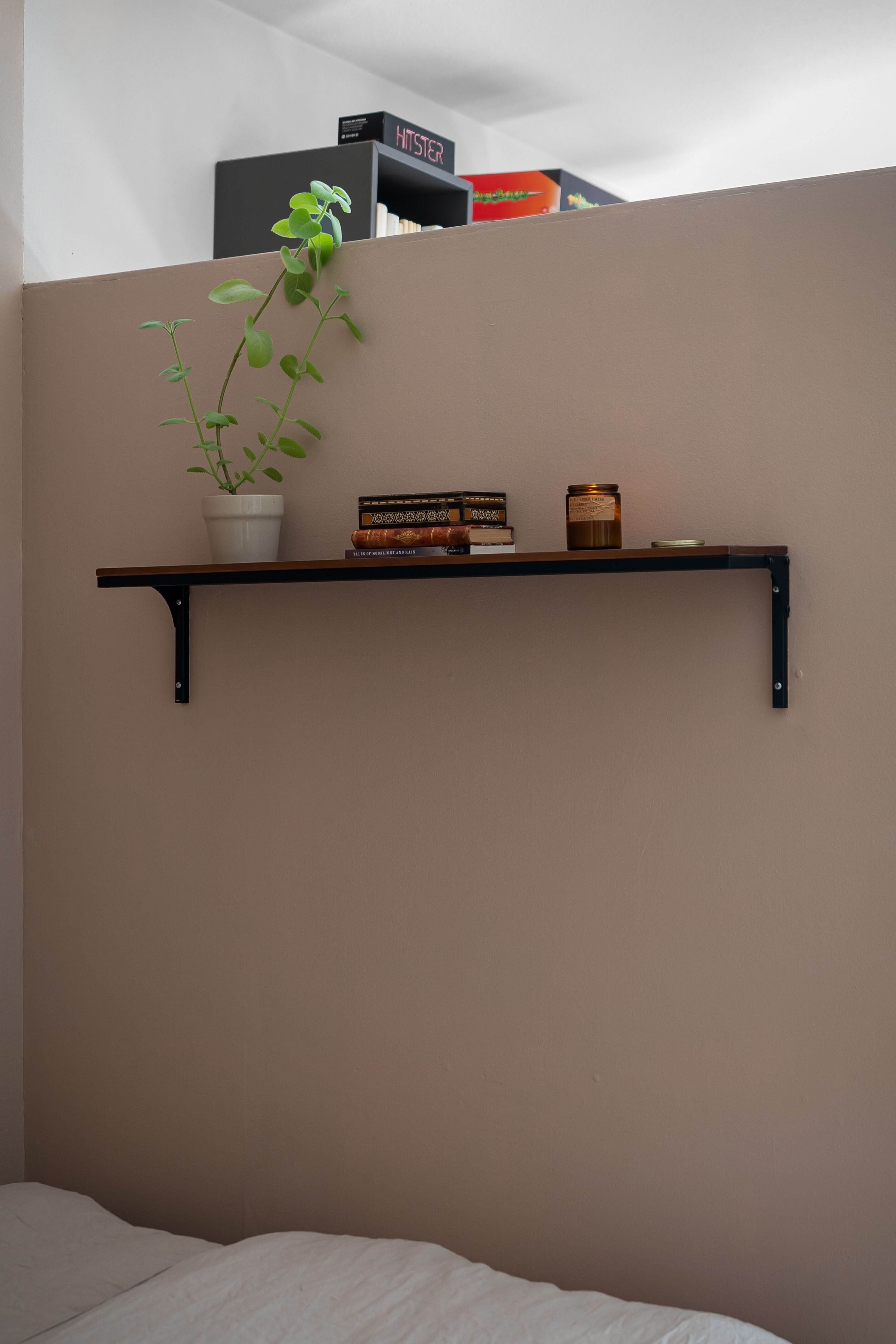 adhesive shelf on apartment wall