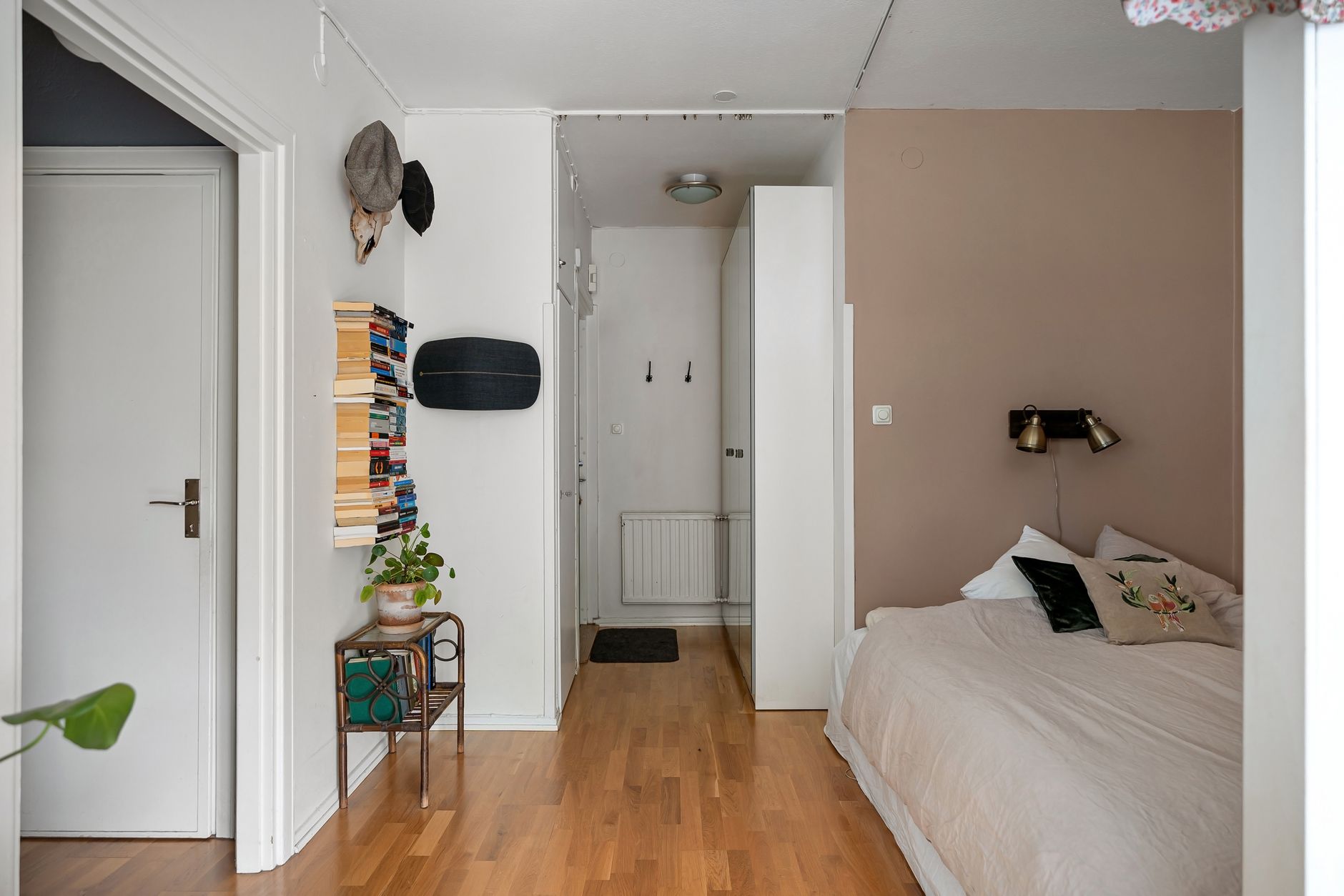 Stylish modern bedroom with minimalist decor and an ultra quiet humidifier for better sleep