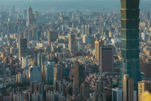 A breathtaking aerial view of Taipei, showcasing its modern skyline and iconic Taipei 101.