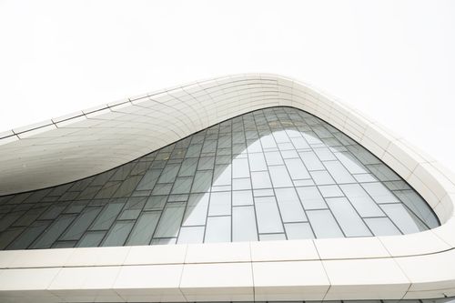 Free Explore the sleek, modern curves of the Heydar Aliyev Center in Baku, Azerbaijan. Stock Photo