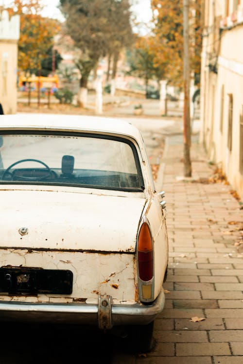 White, Vintage Car on Street