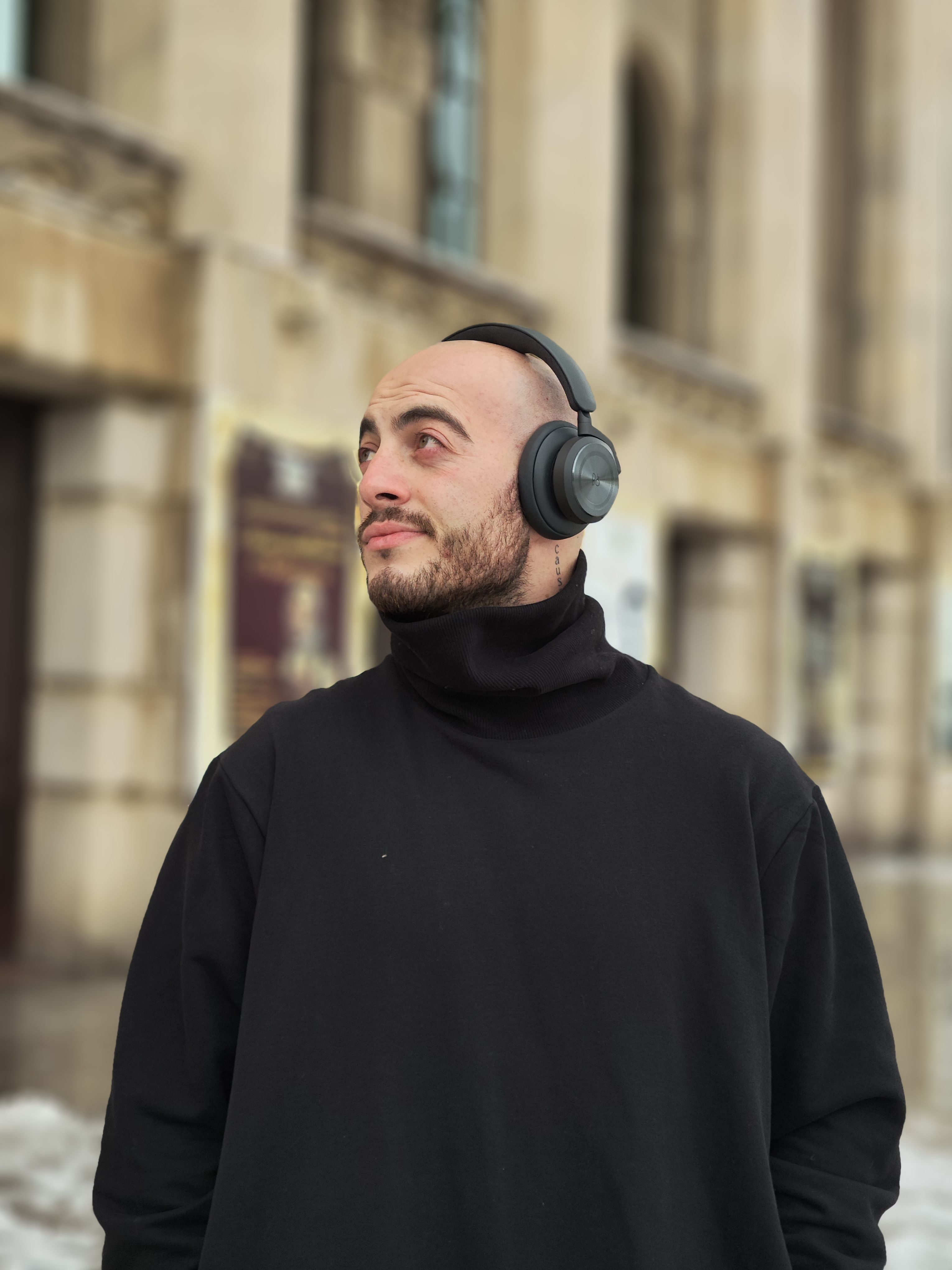 Bald Man in Black Clothes and Headphones · Free Stock Photo