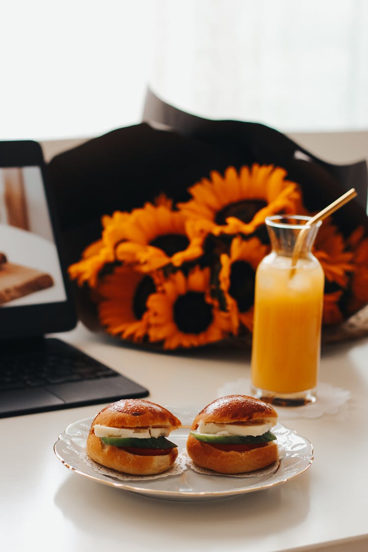 Small Burgers With Mozzarella On White Plate