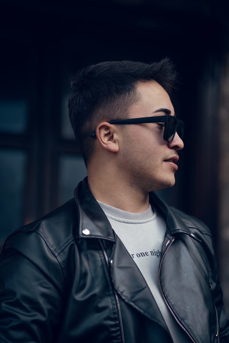 Portrait Of Man Wearing Sunglasses And Leather Jacket 