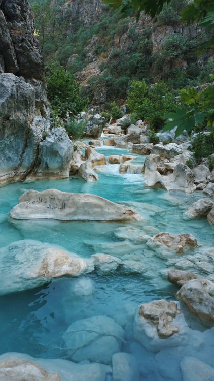 Blue Stream Made From Rocks Rocks on Blue Stream in Canyon · Free Stock Photo