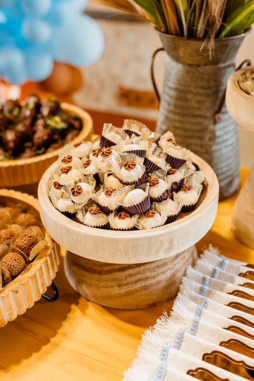 Free A variety of homemade candies and sweets artfully displayed on a wooden table, perfect for dessert lovers. Stock Photo