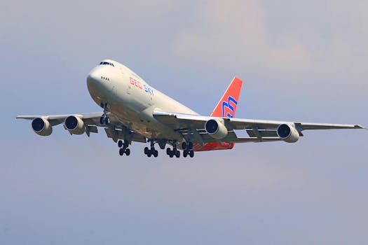 A commercial airplane soaring through the sky, showcasing modern aviation technology.