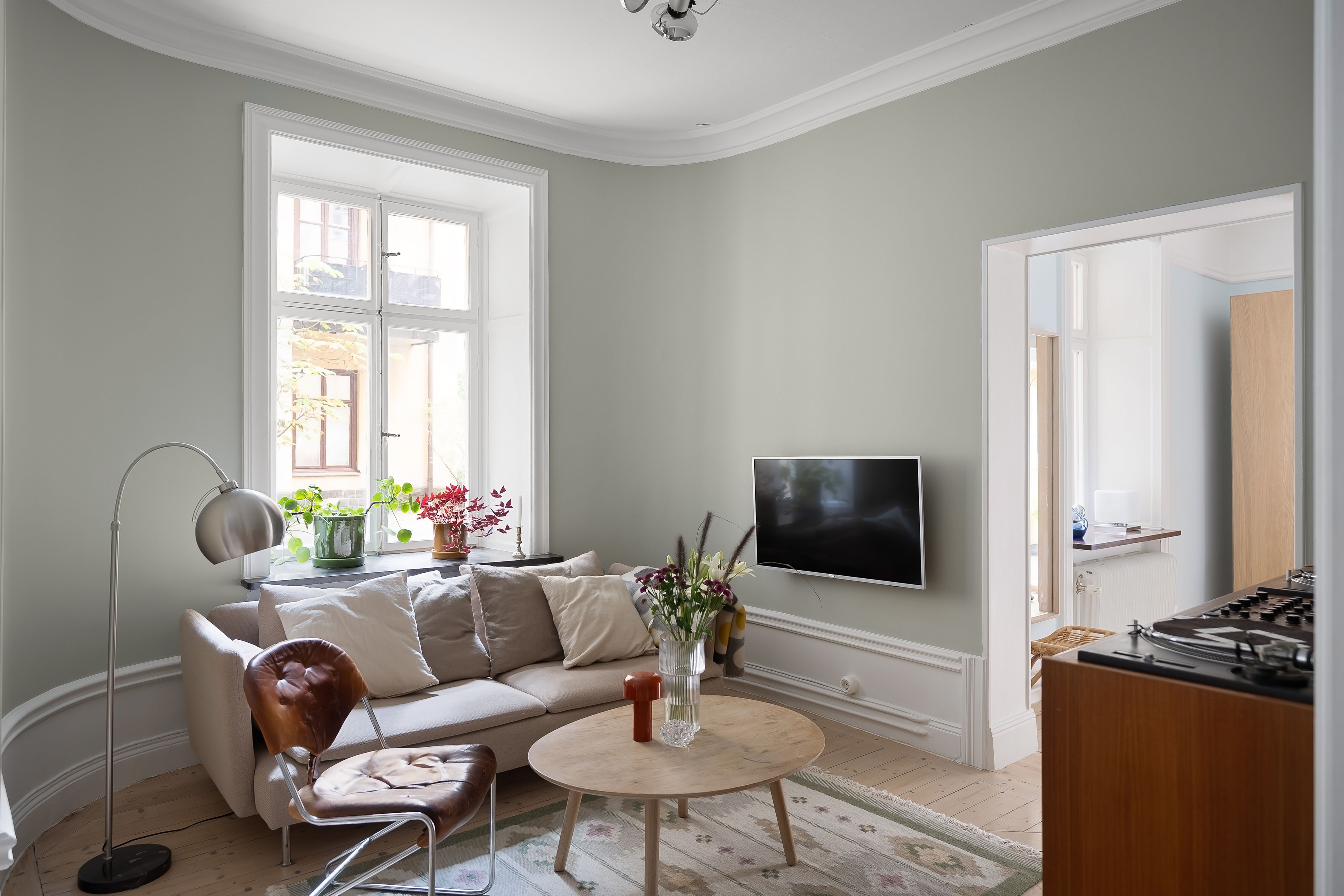 Contemporary sofa seating in a refined neutral living room