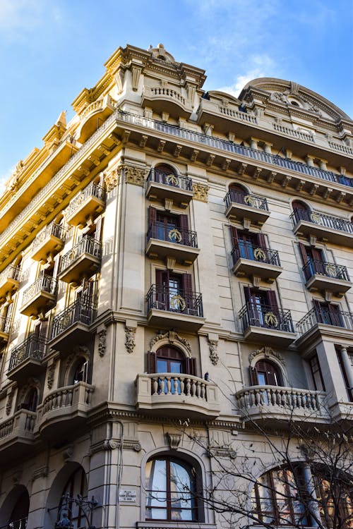Free A building with balconies and balconies on the top Stock Photo