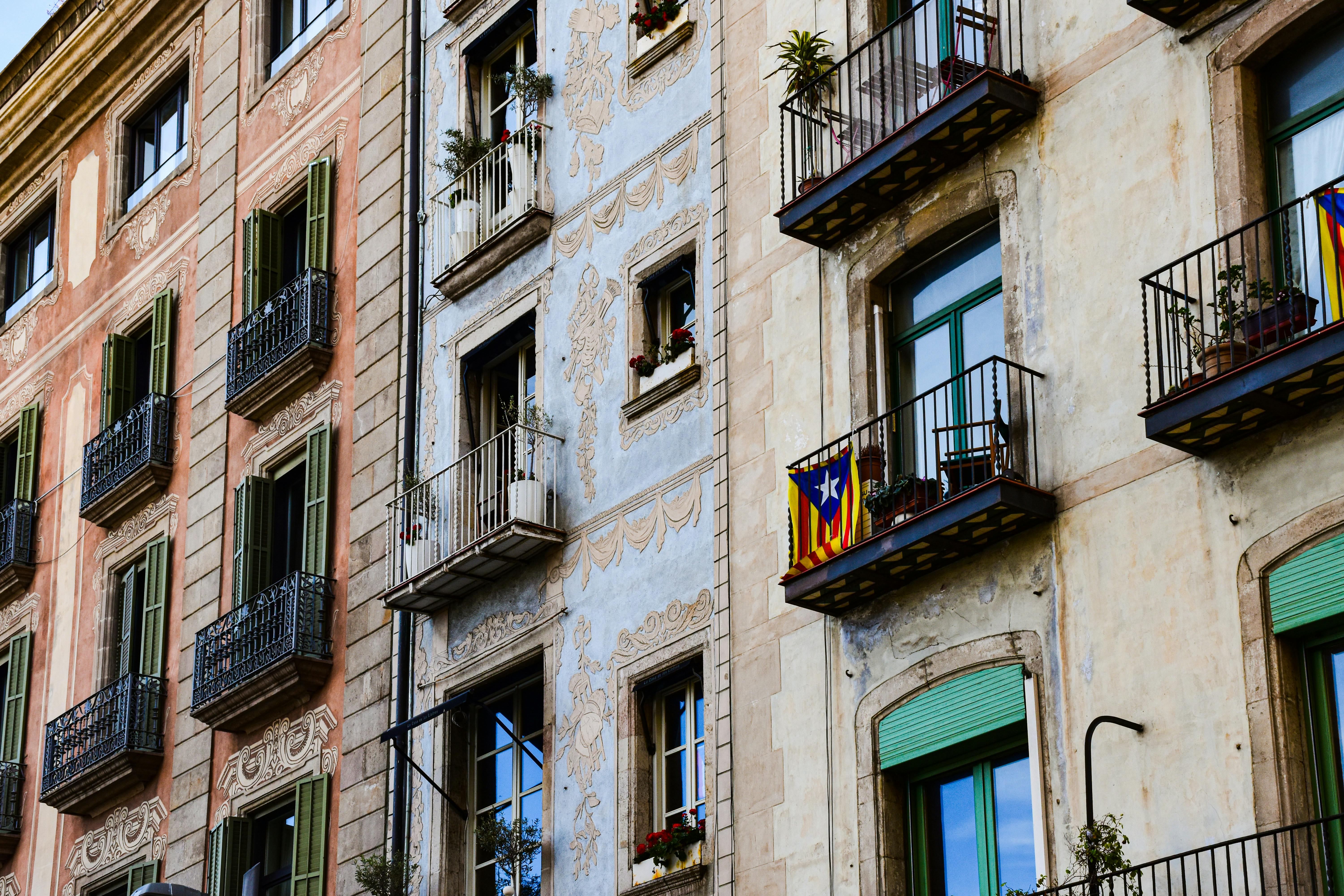 balconies in a tenement by the street in barcelona