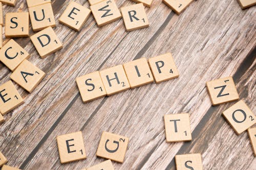 The word ship spelled out in scrabble letters
