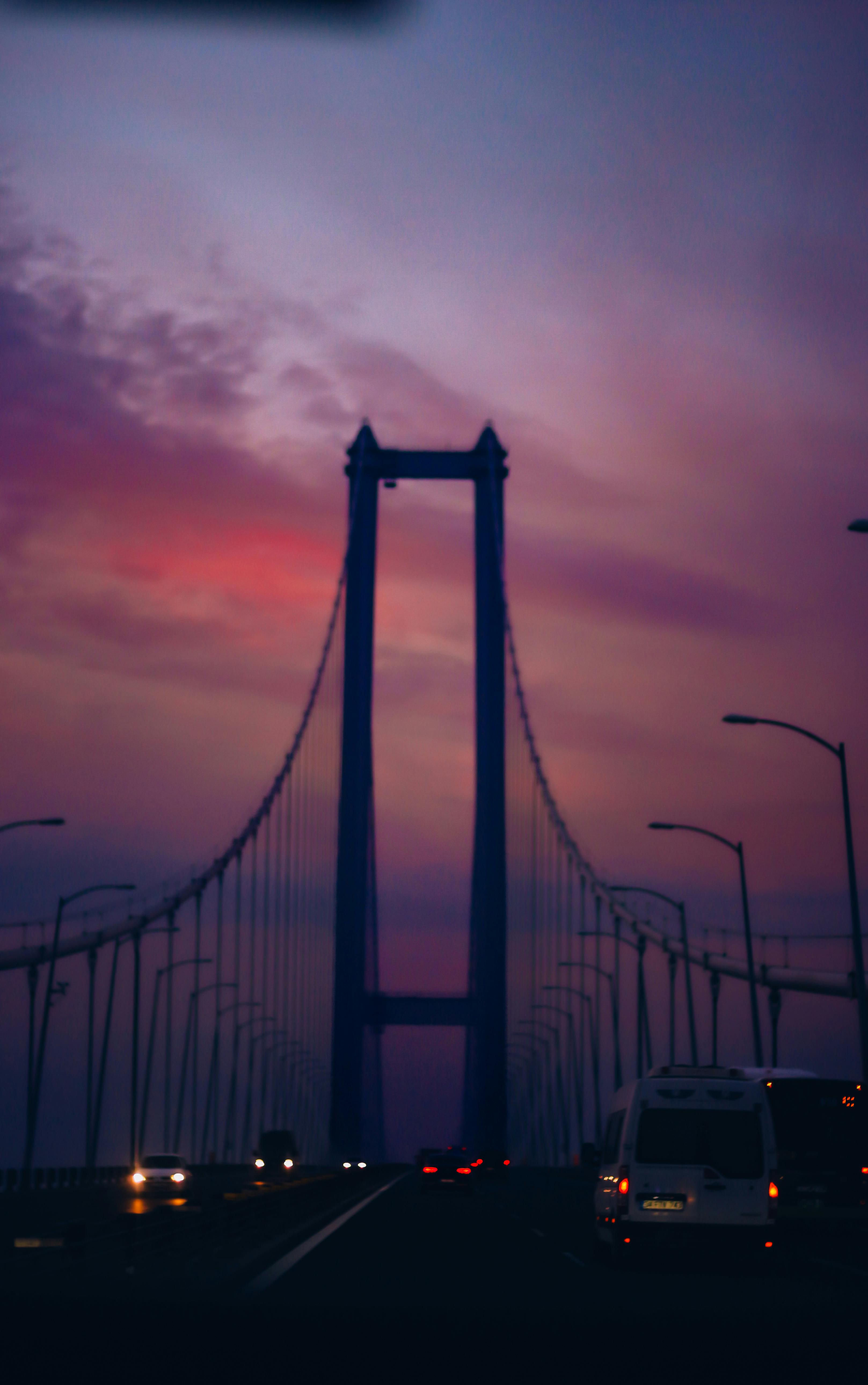 Car On Bridge At Dawn Free Stock Photo car-on-bridge-at-dawn-free-stock-photo