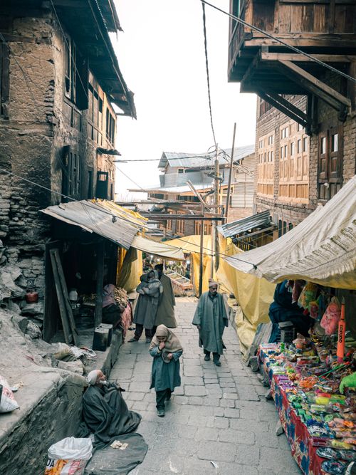 Free A lively market scene in a traditional town, capturing local life and vibrant street stalls. Stock Photo