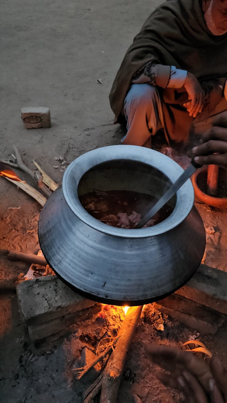 Cooking In Pot On Bonfire