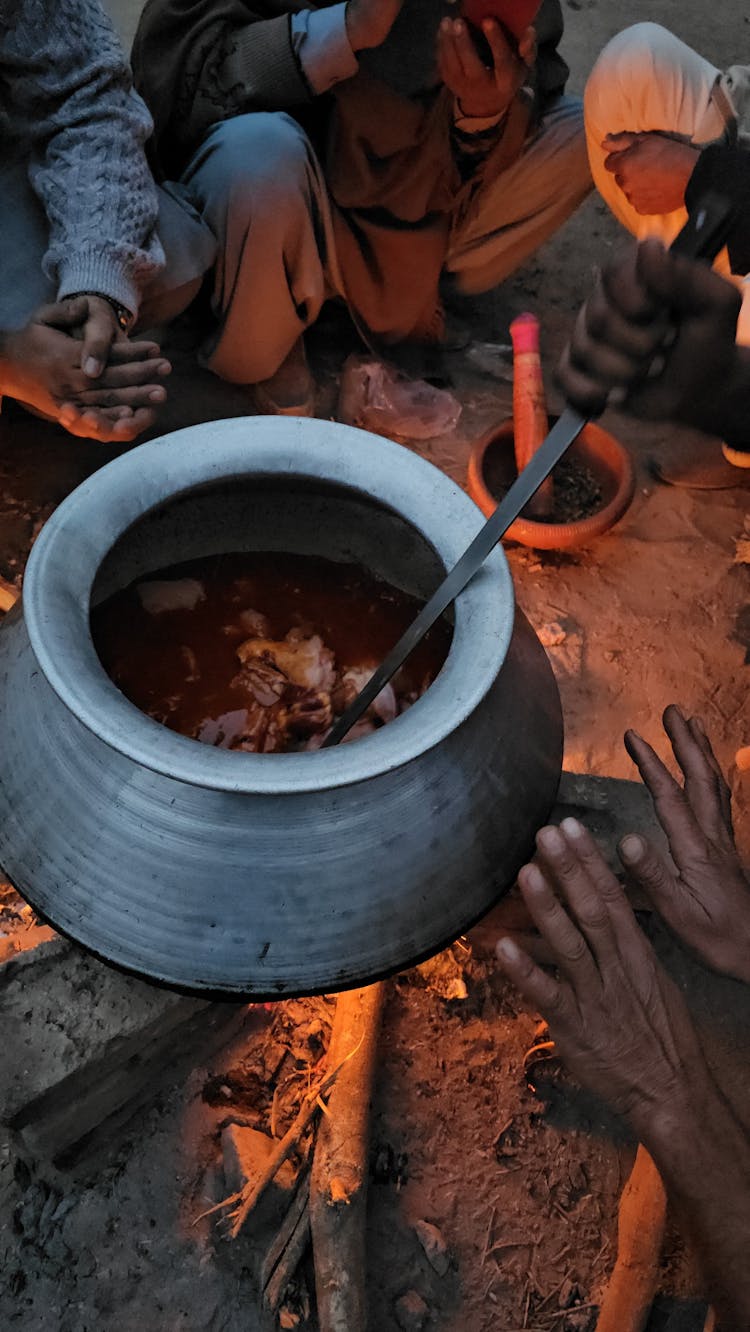 Cooking In Pot On Bonfire