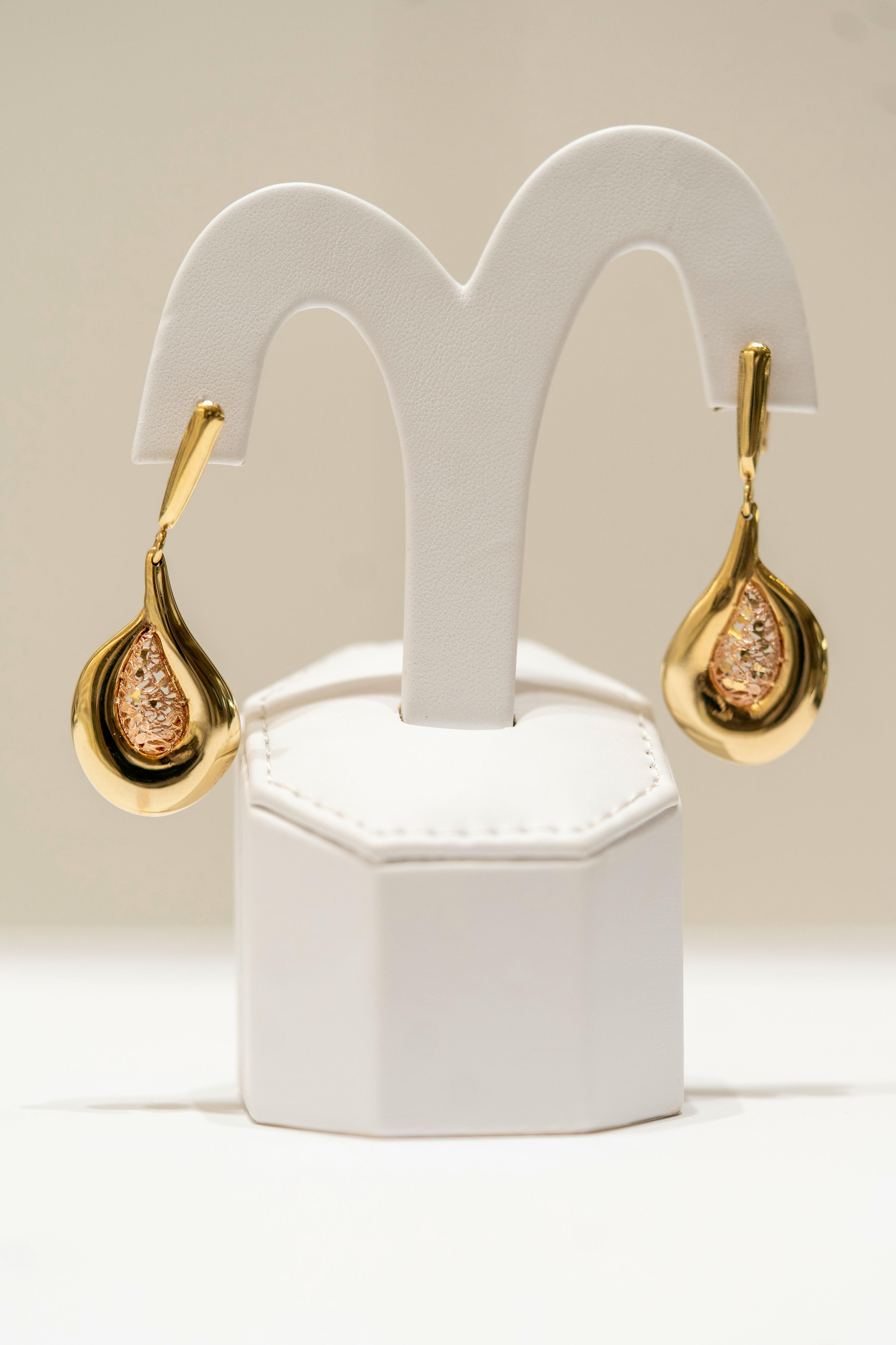 display of gold earrings