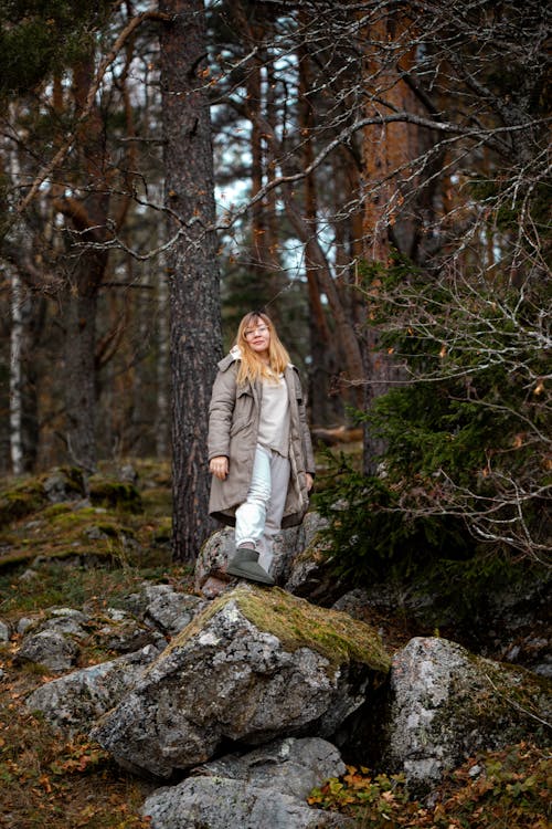Woman in Jacket in Forest