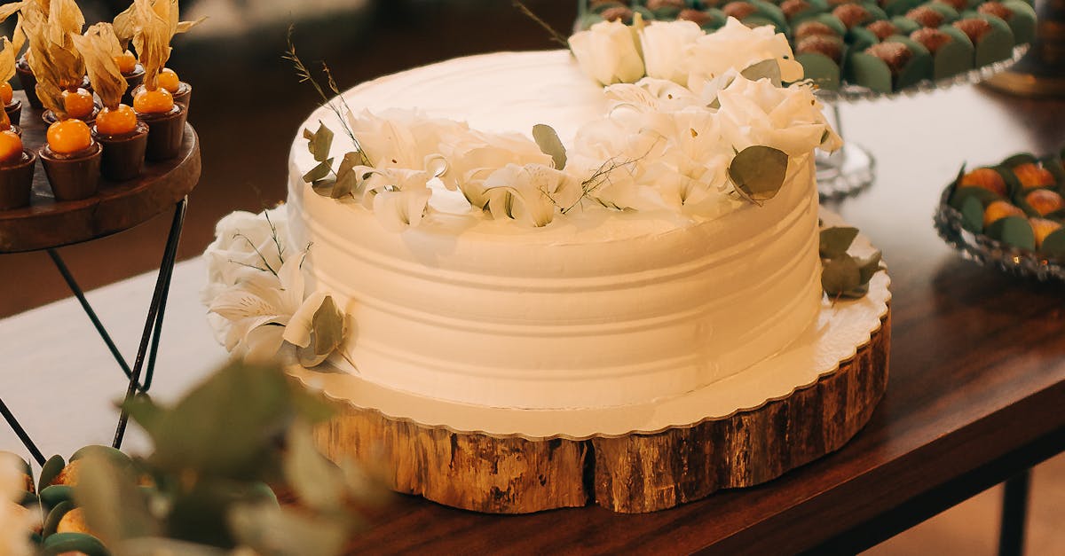 A beautifully decorated outdoor dining table set up for a luxurious catering event.
