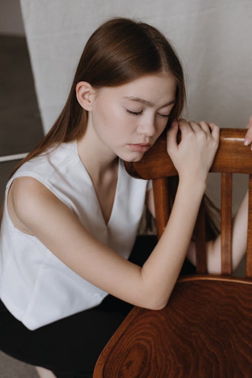 Portrait of Woman Leaning on Chair