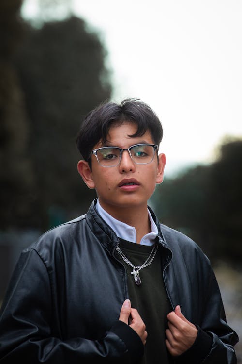 Portrait of Man in Eyeglasses and Leather Jacket