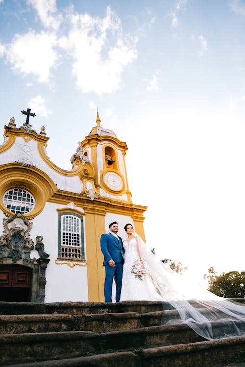 Newlyweds in Front of a Church