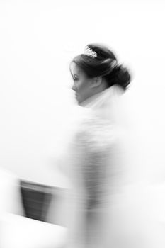 Elegant motion blur portrait of a bride in São Paulo, capturing grace and movement.