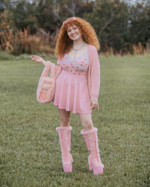 Smiling Redhead Model in Fluffy Boots