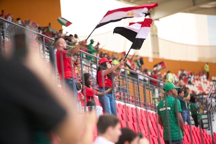 People With Flags Of Egypt At Stadium