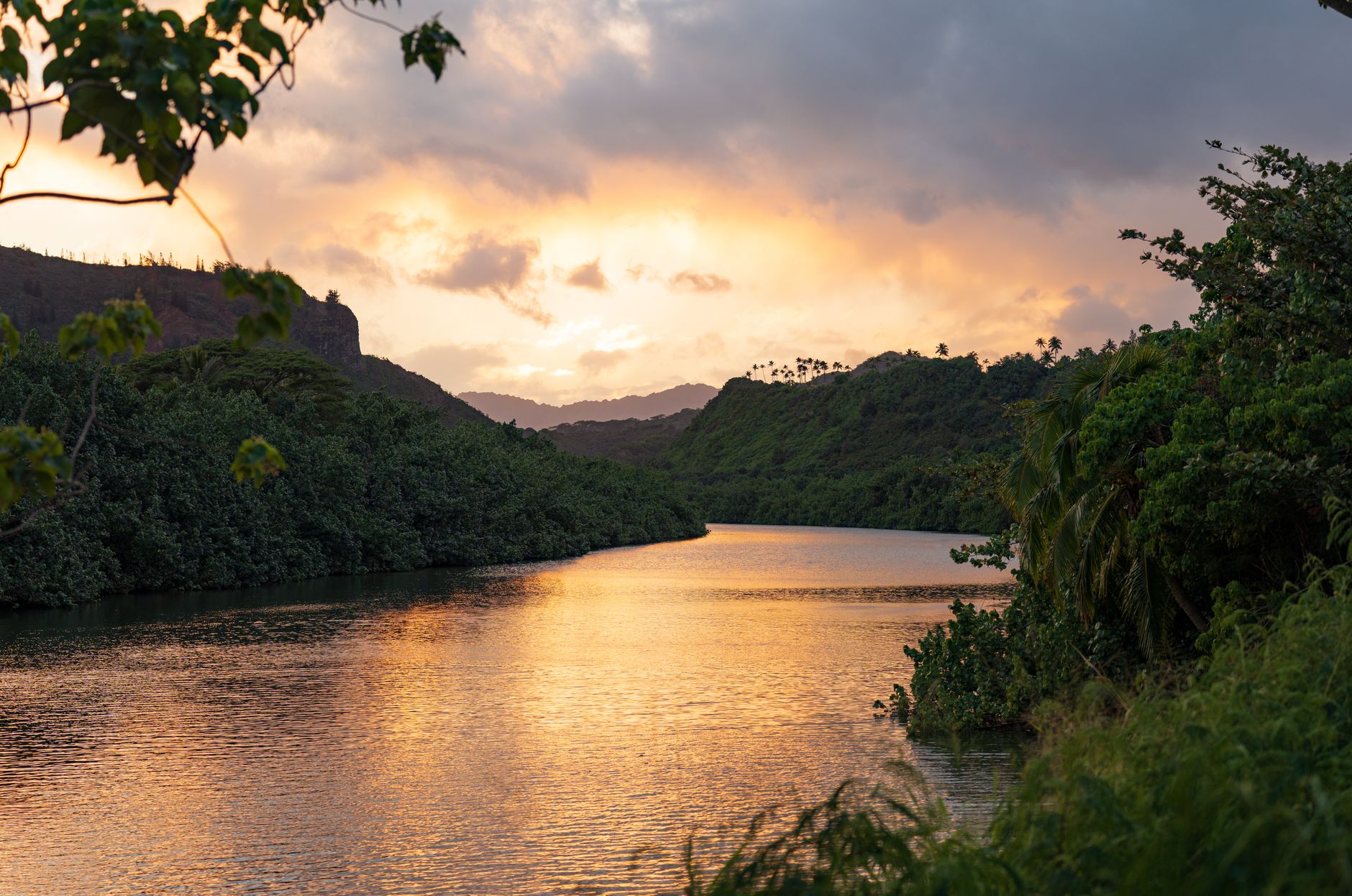 Sunset over the Wailua River and lush greenery on Kauai's east side