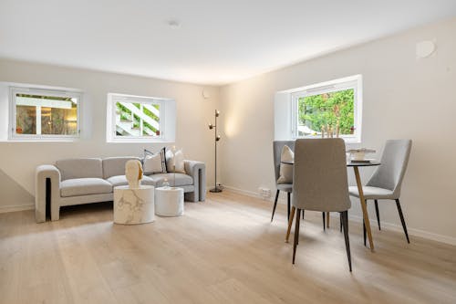 Kostnadsfri bild av grå soffa, inredningsdesign, lägenhet