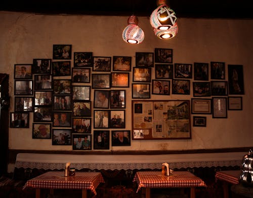 Free A restaurant with pictures hanging on the wall Stock Photo