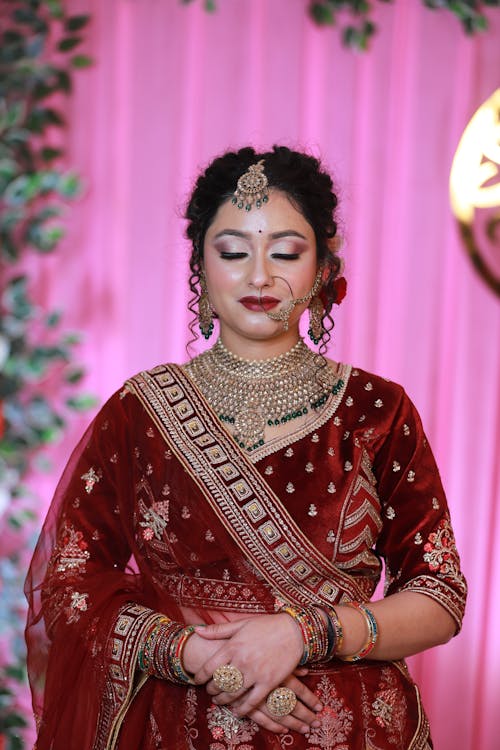 Photo of a Bride in Traditional Clothing, Jewelry and Makeup 