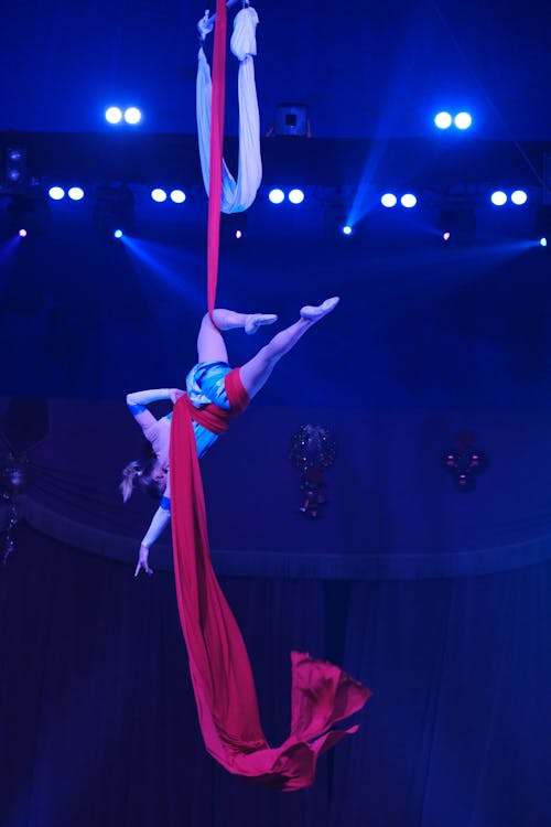 Woman Doing Acrobatics with Aerial Silks